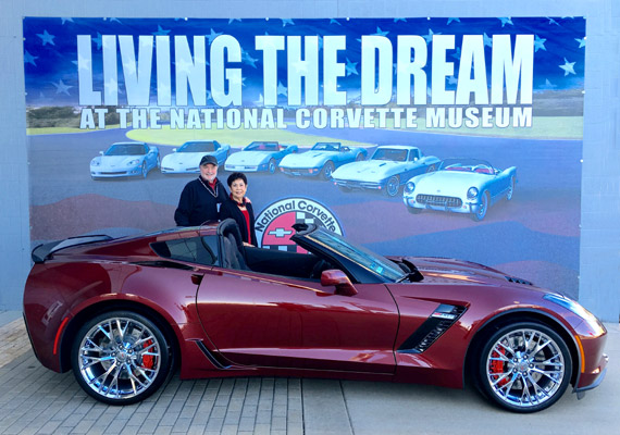 Mike Bell stands beside his brand-new 2016 Chevrolet Corvette Z06 in Long Beach Red, with his wife, Malea