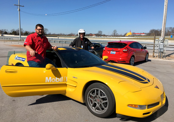 Mike Bell takes a spin around the test track at the Bowling Green Assembly Plant