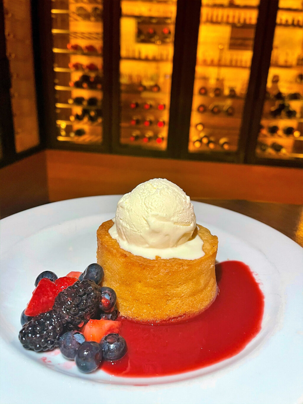 Warm Butter Cake: fresh berries, vanilla ice cream, raspberry sauce