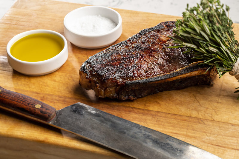 Dry-aged bone-In New York steak (photo by Sabin Orr)
