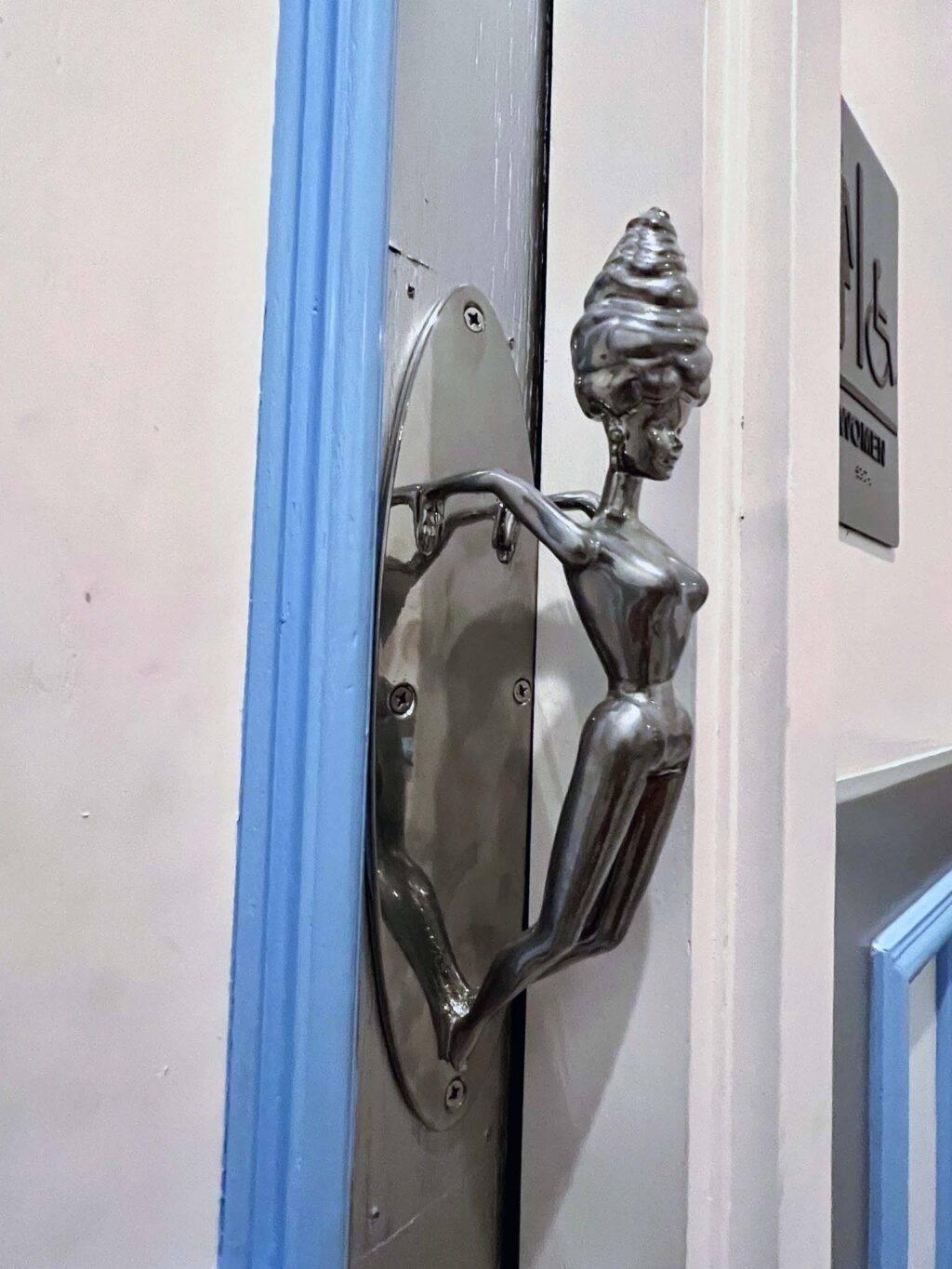 Ladies room doorhandle